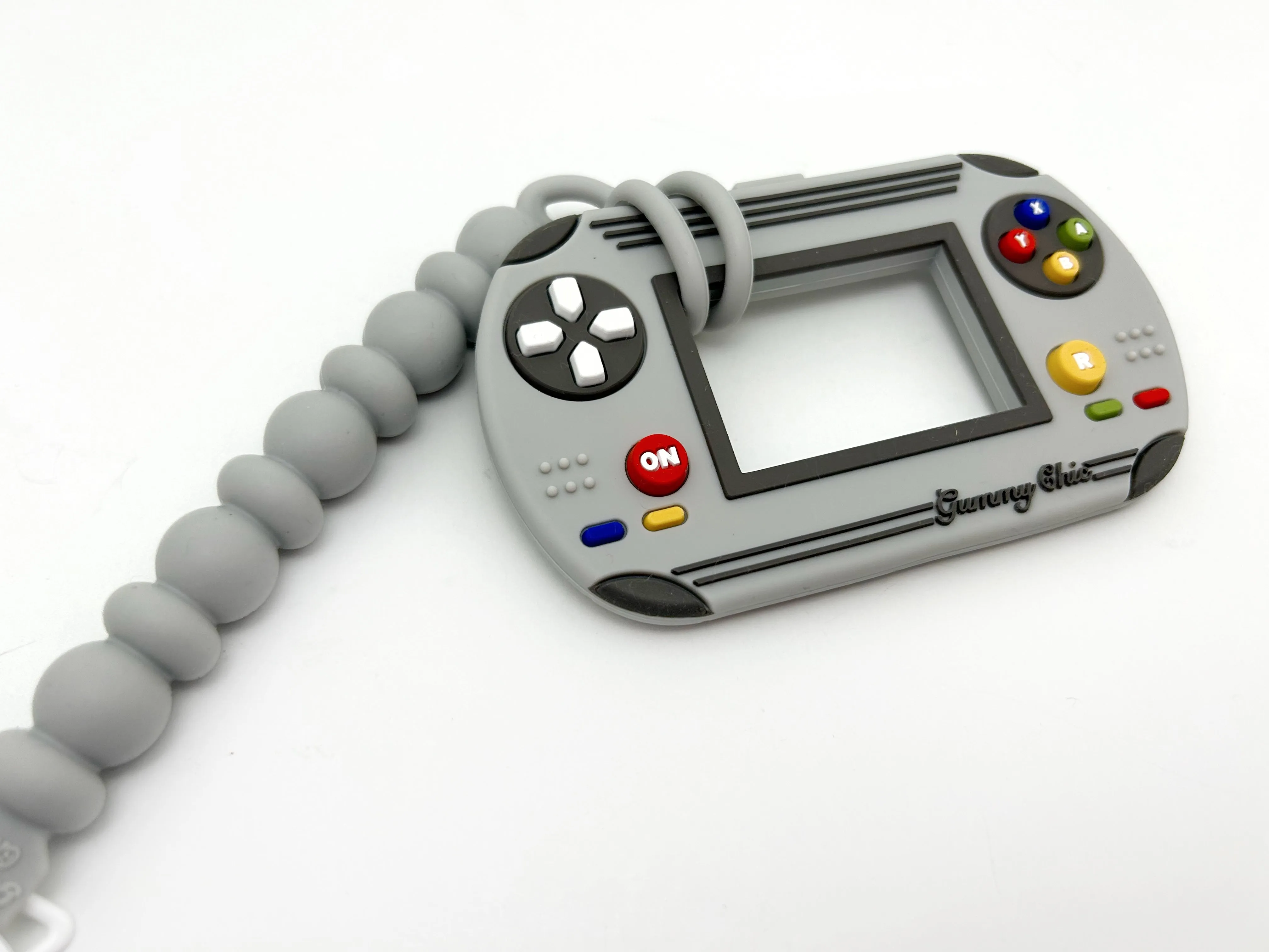 Gummy Chic Video Game Silicone Teether: Nostalgic & Safe Choice