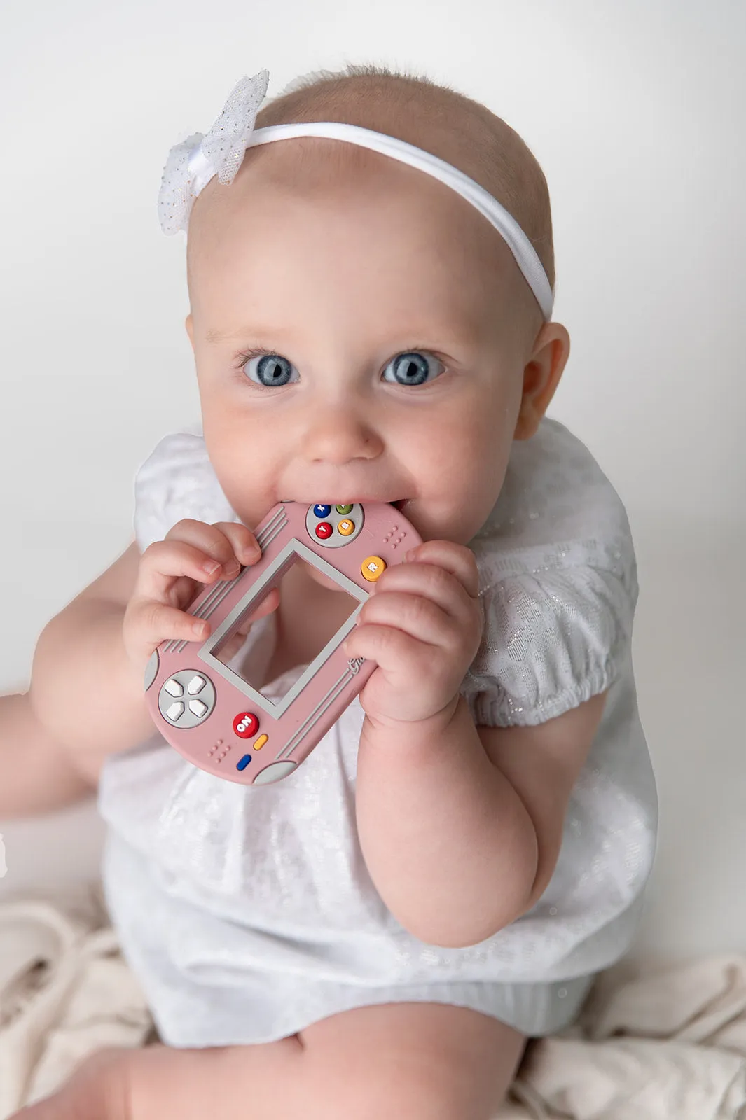 Gummy Chic Video Game Silicone Teether: Nostalgic & Safe Choice